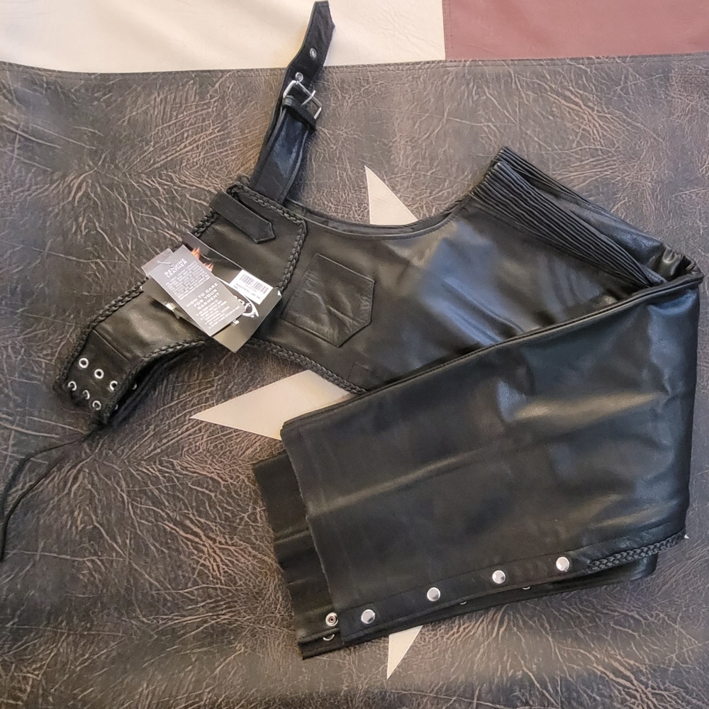 Brand NEW black leather chaps.